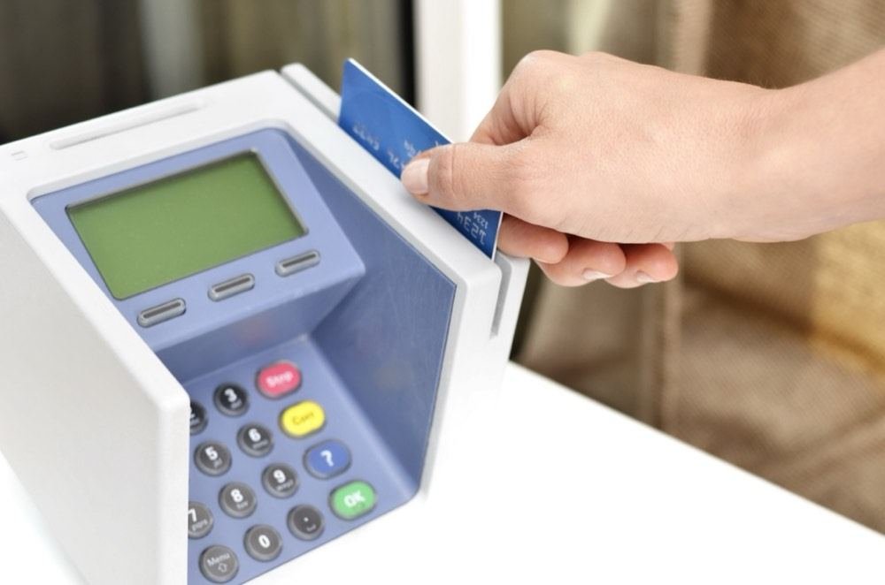 Un pago con tarjeta. El objeto del artículo es literalmente esto, y no hacía falta buscar nada más abstracto.